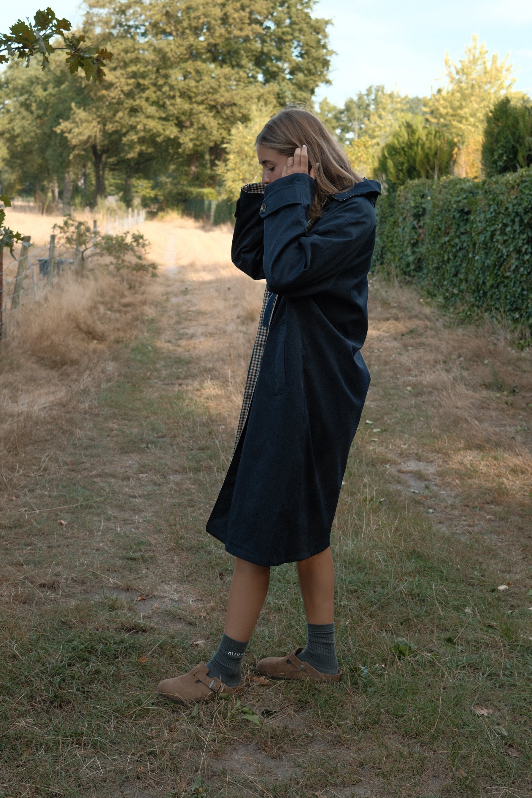 THE REVERSIBLE CHECK TRENCH COAT NAVY