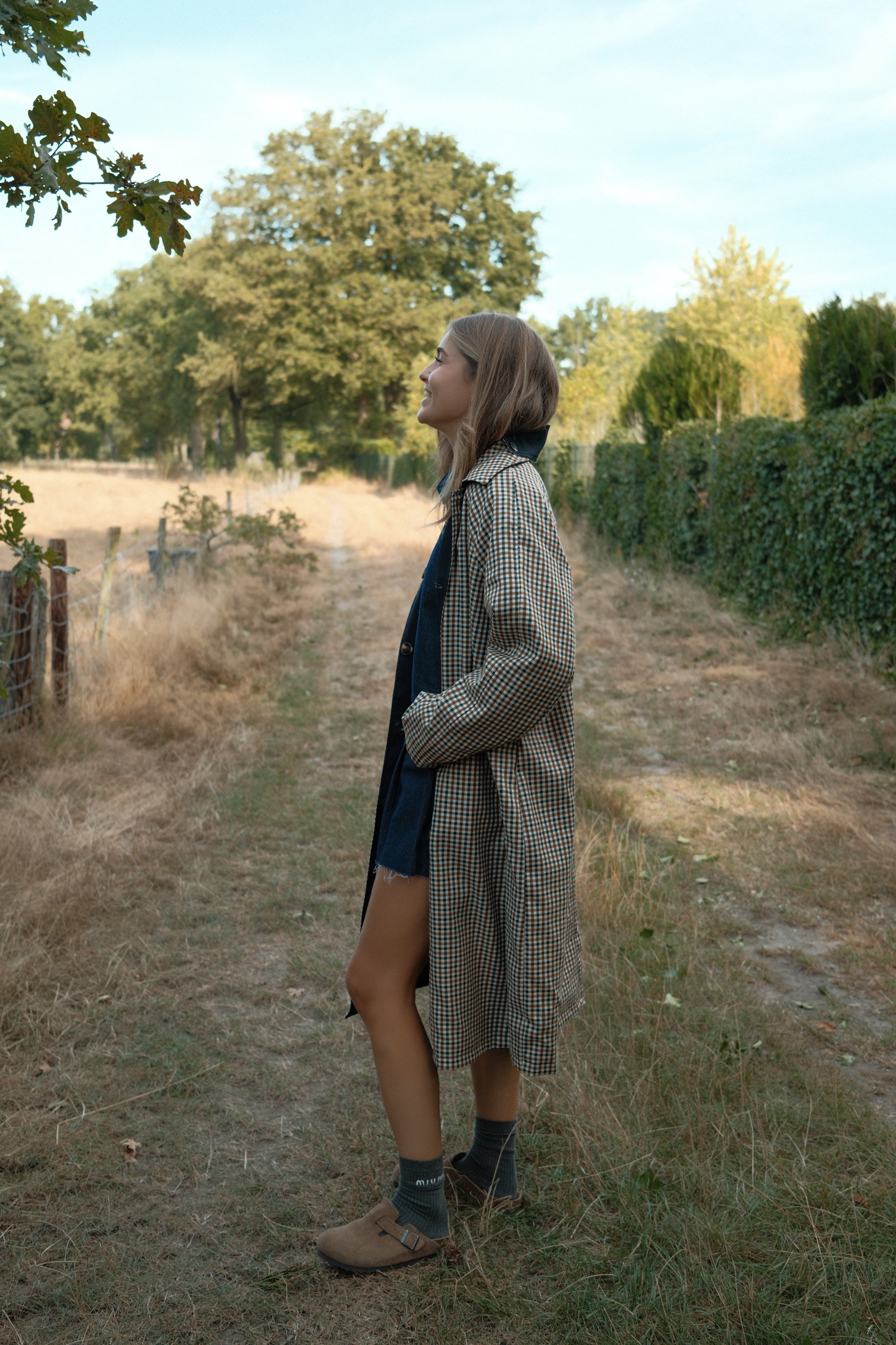 THE REVERSIBLE CHECK TRENCH COAT NAVY