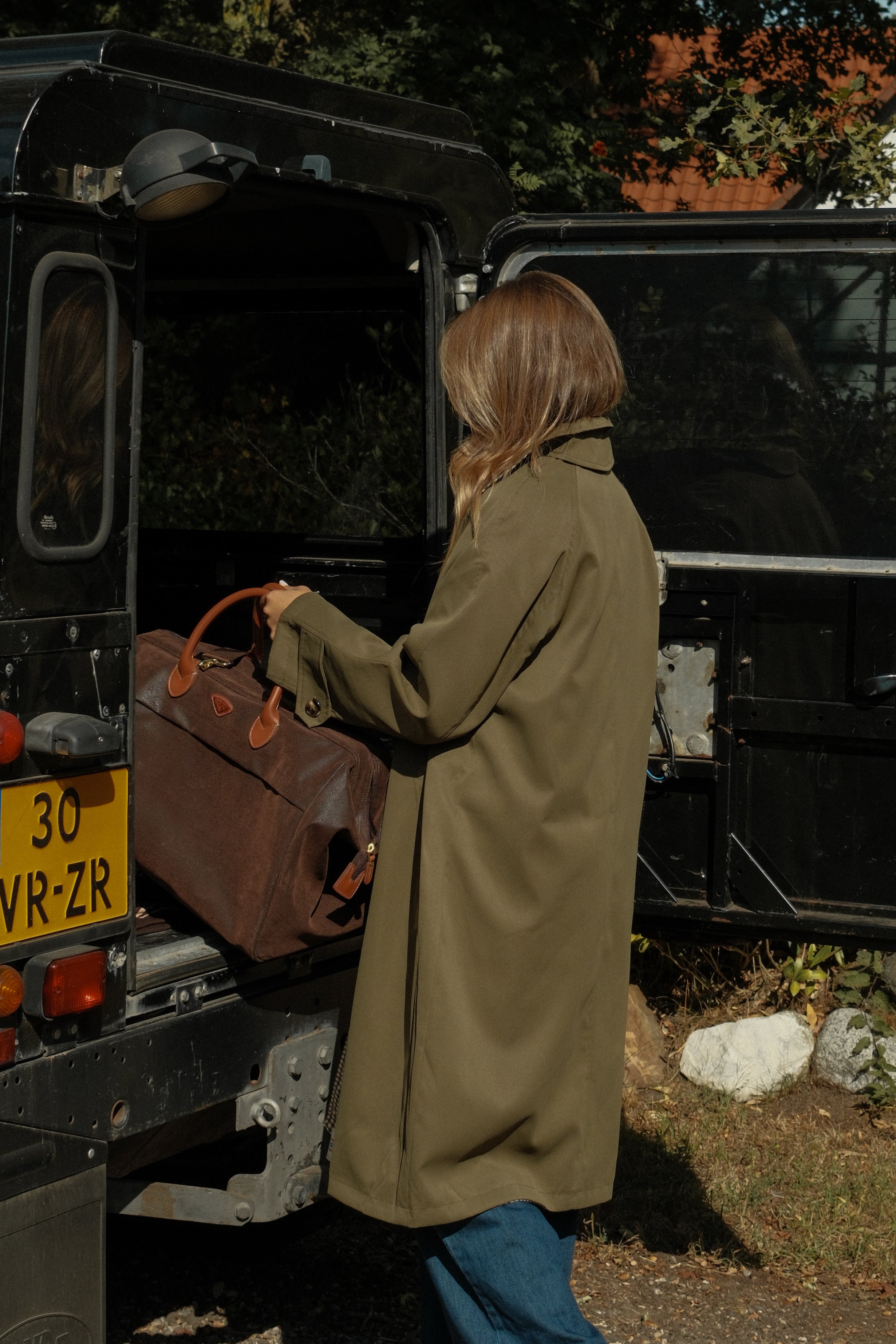 THE REVERSIBLE CHECK TRENCH COAT GREEN