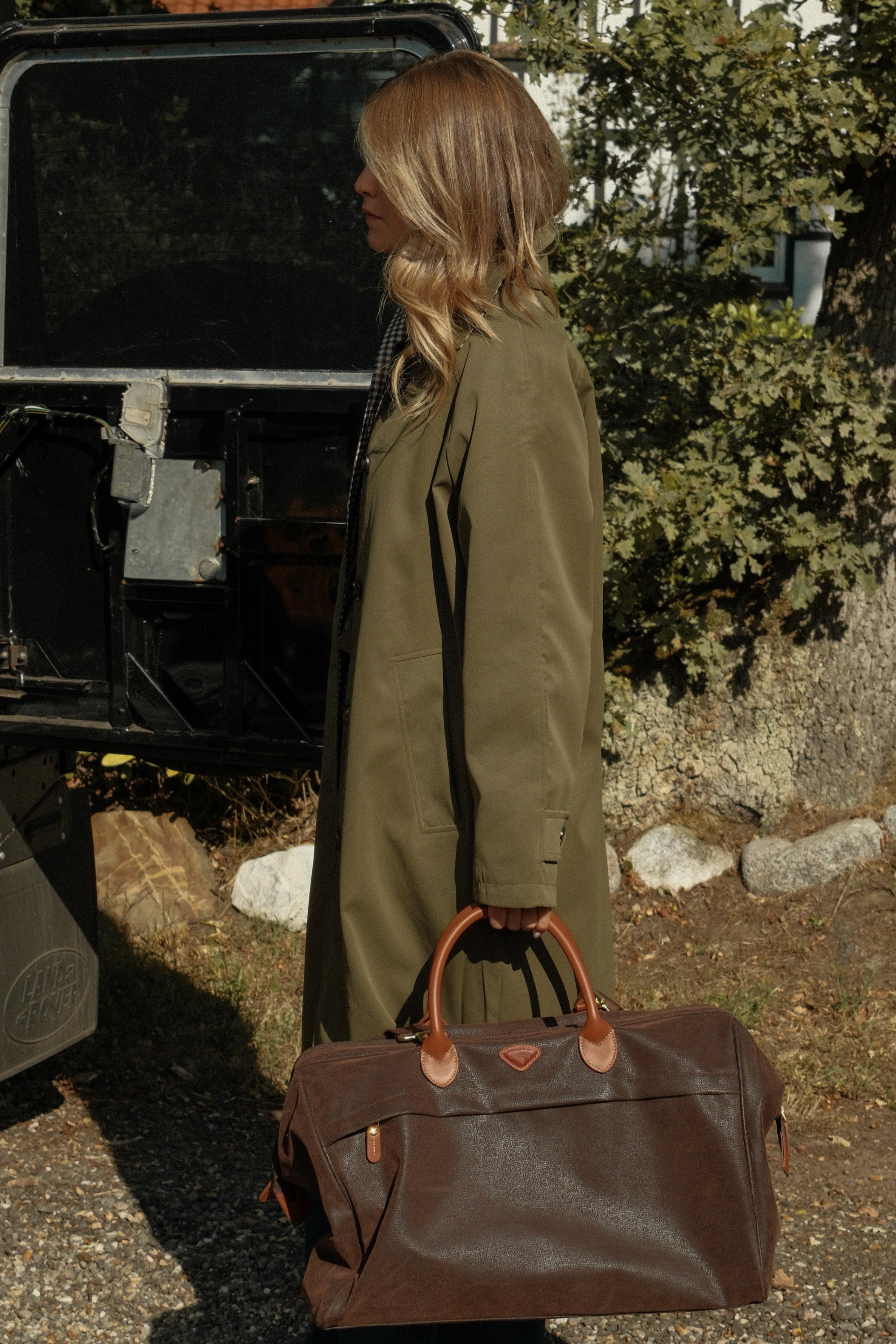 THE REVERSIBLE CHECK TRENCH COAT GREEN