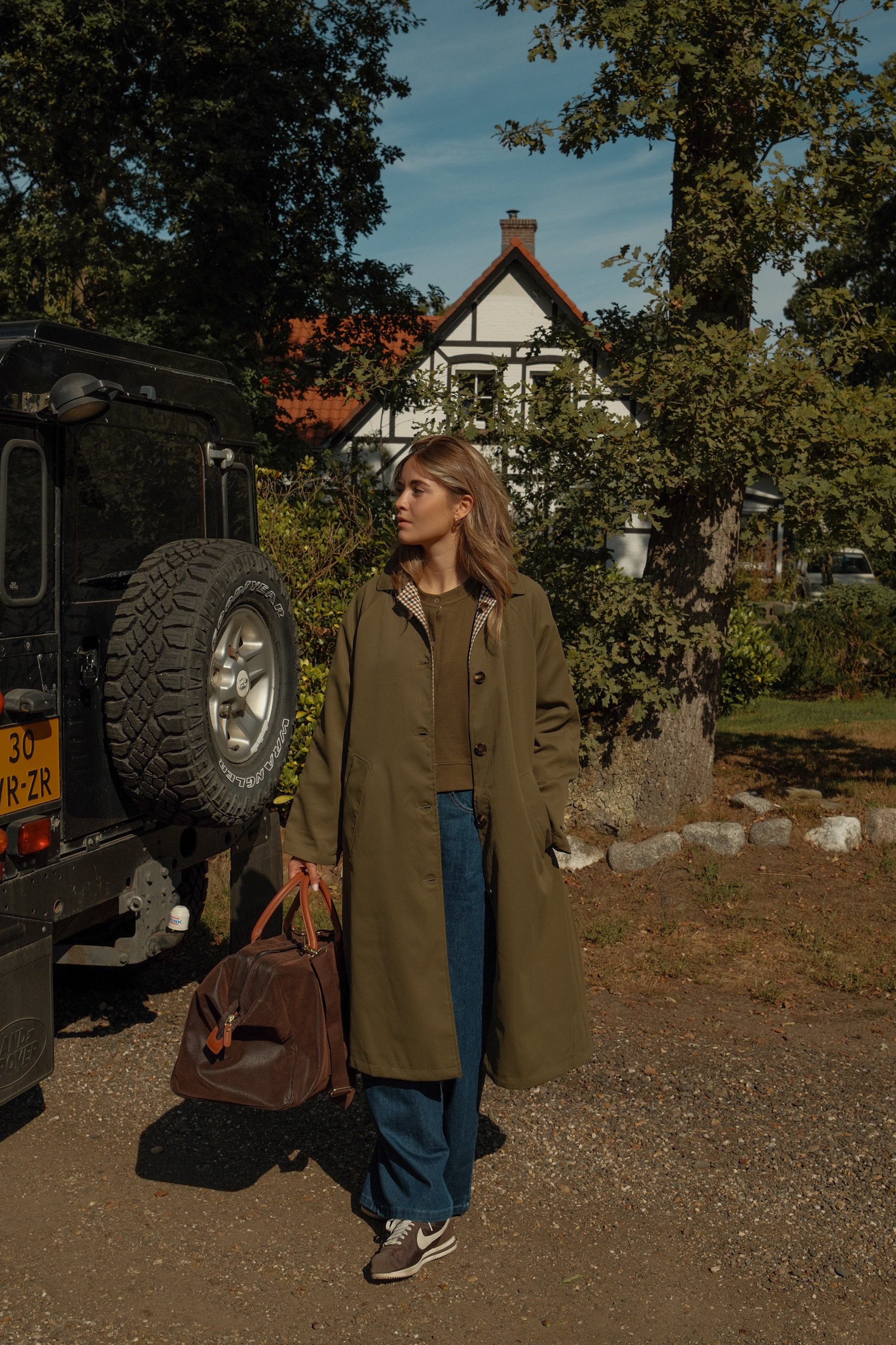 THE REVERSIBLE CHECK TRENCH COAT GREEN