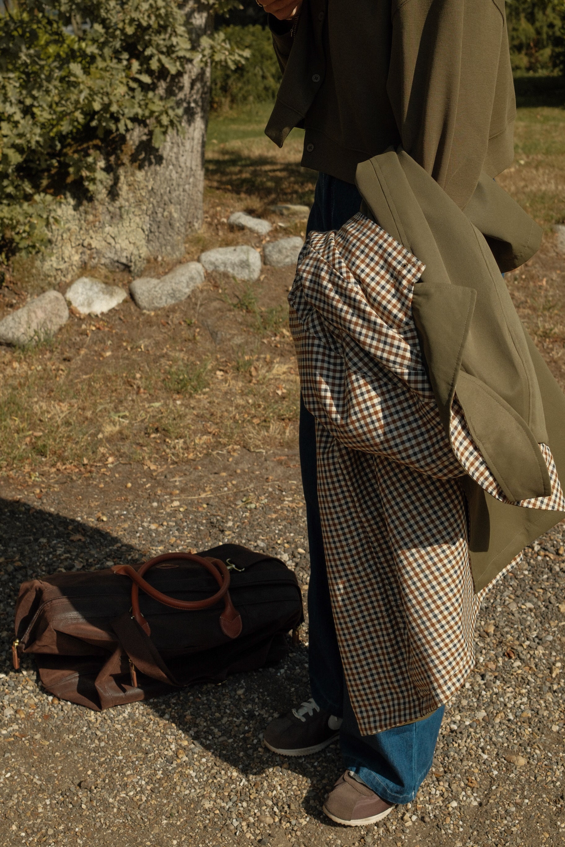 THE REVERSIBLE CHECK TRENCH COAT GREEN