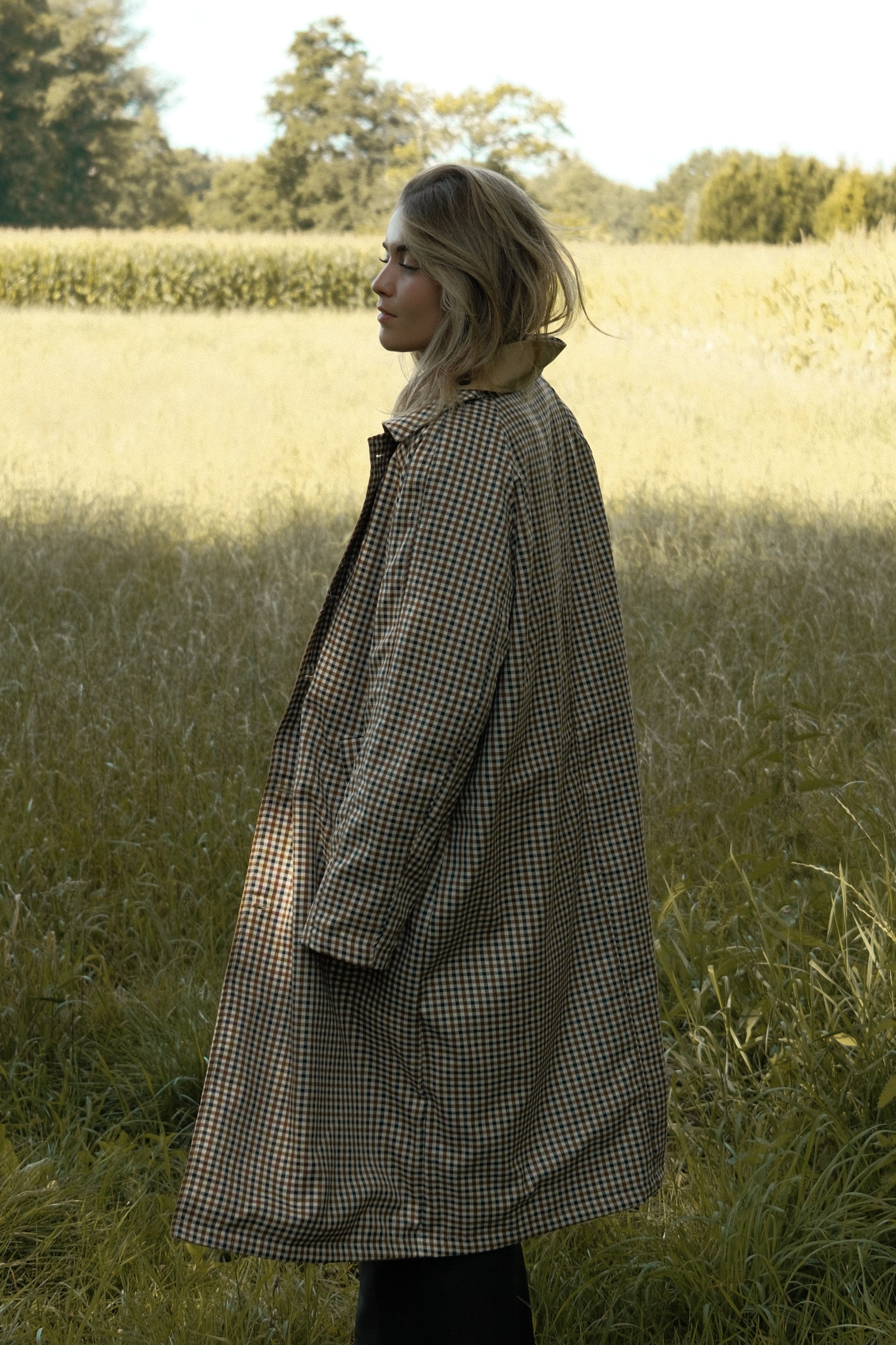 THE REVERSIBLE CHECK TRENCH COAT BEIGE