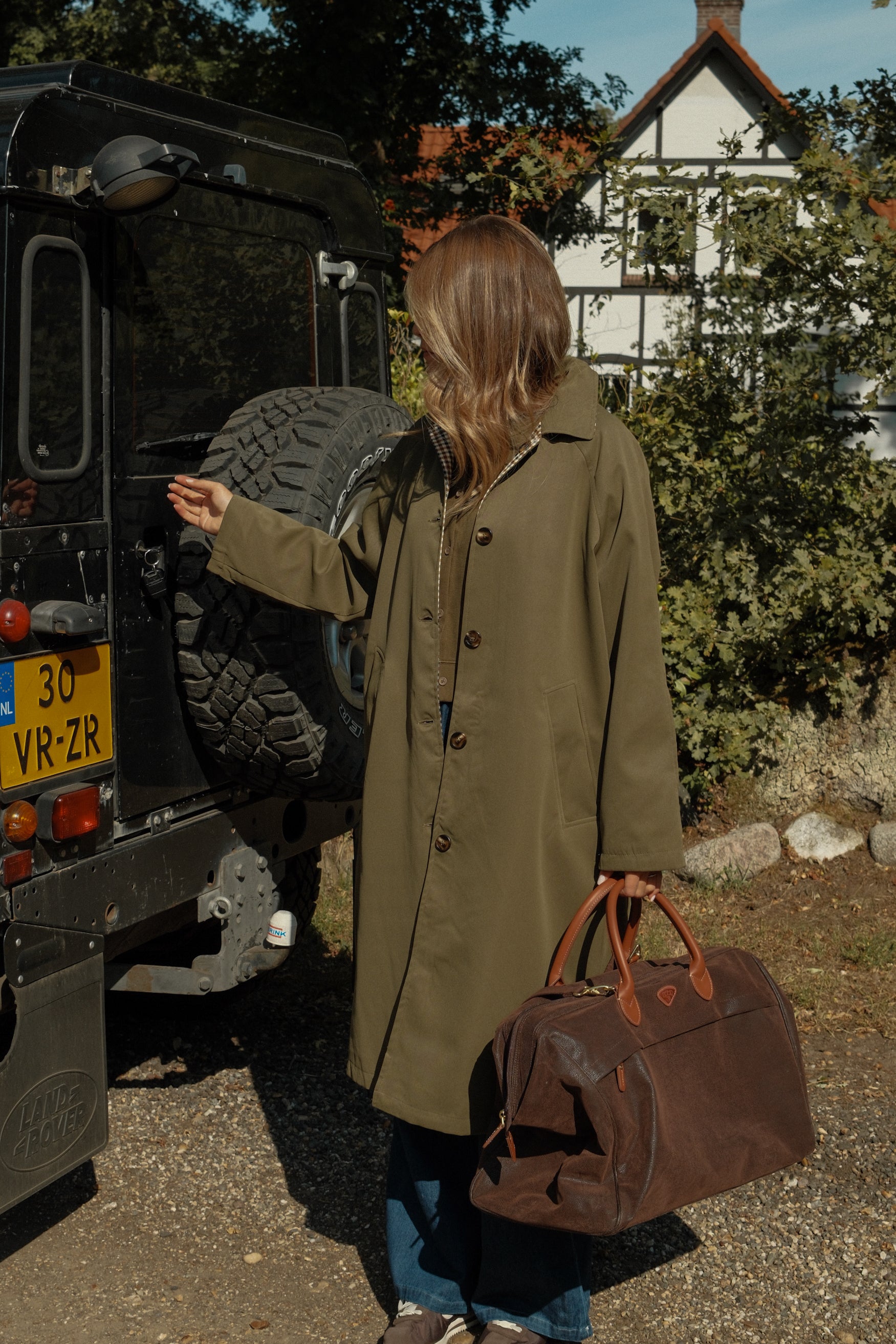 THE REVERSIBLE CHECK TRENCH COAT GREEN